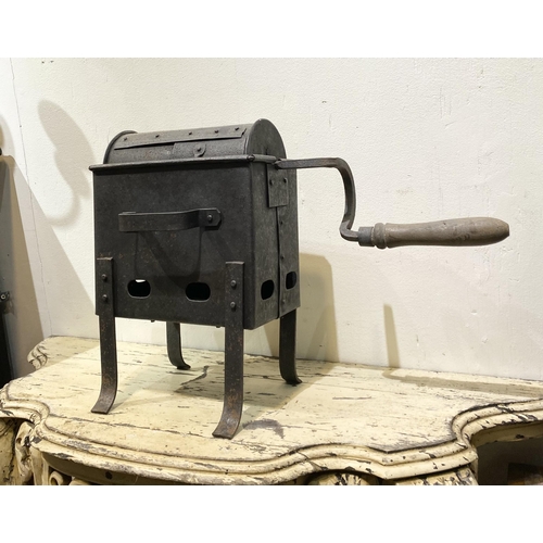 255 - A VINTAGE CAST COFFEE BEAN ROASTER, the cylinder has a sliding door which beans go in and then sit i... 