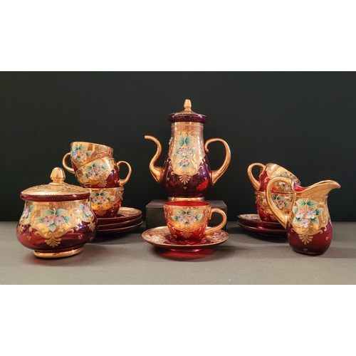 27 - A VINTAGE BOHEMIAN ENAMEL DECORATED COFFEE SET, complete with coffee pot, jug, sugar bowl, 6 cups & ... 