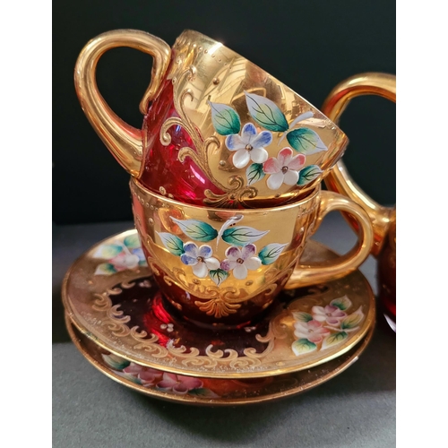 27 - A VINTAGE BOHEMIAN ENAMEL DECORATED COFFEE SET, complete with coffee pot, jug, sugar bowl, 6 cups & ... 