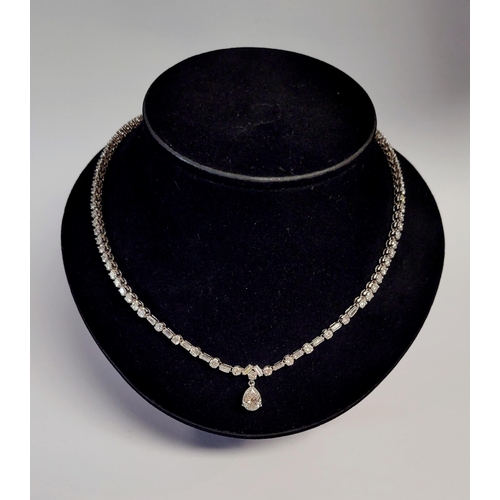 3 - A REALLY STUNNING WHITE GOLD & PLATINUM DIAMOND NECKLACE, with an approximate carat weight of 8 in t... 