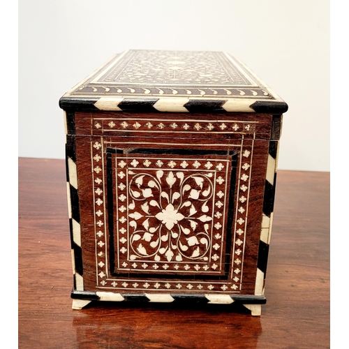 38 - A BEAUTIFULLY CRAFTED INLAID TEA CADDY, decorated all over with inlaid design, the hinged lid openin... 