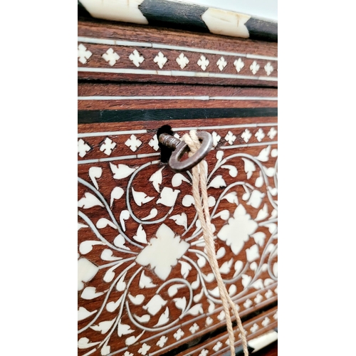 38 - A BEAUTIFULLY CRAFTED INLAID TEA CADDY, decorated all over with inlaid design, the hinged lid openin... 