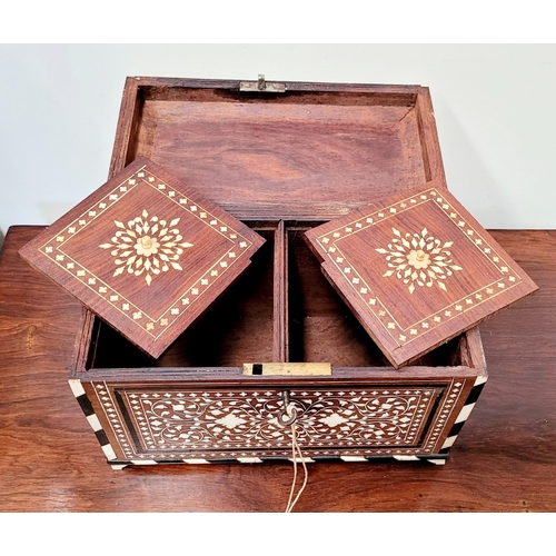 38 - A BEAUTIFULLY CRAFTED INLAID TEA CADDY, decorated all over with inlaid design, the hinged lid openin... 