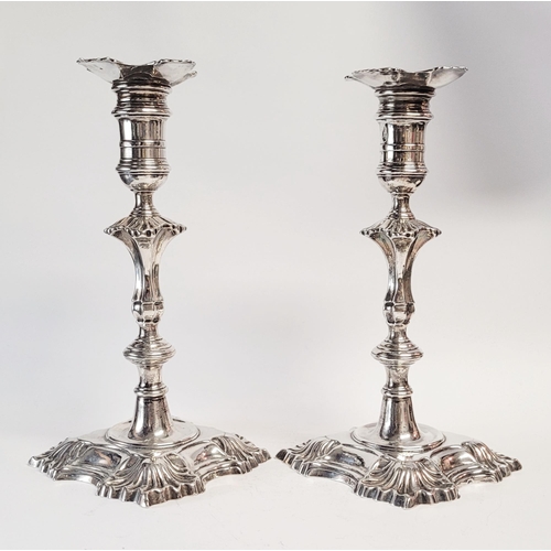 48 - AN EXPERTLY CRAFTED PAIR OF IRISH MID 18TH CENTURY GEORGE II SILVER CANDLE STICKS, by J. Dolier of D... 