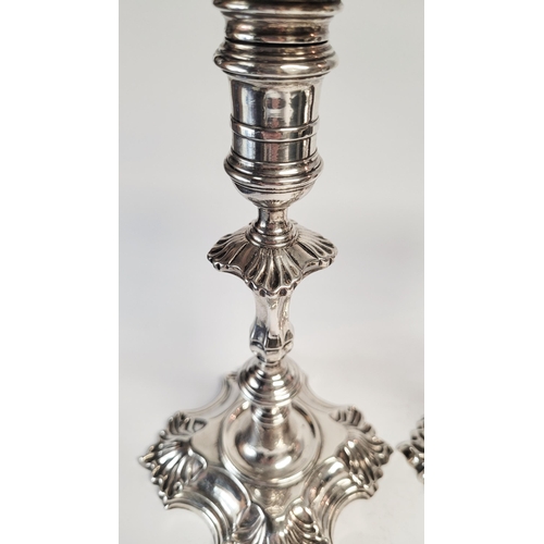 48 - AN EXPERTLY CRAFTED PAIR OF IRISH MID 18TH CENTURY GEORGE II SILVER CANDLE STICKS, by J. Dolier of D... 