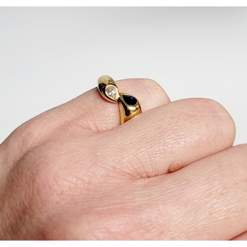 49 - AN 18CT YELLOW GOLD SAPPHIRE & DIAMOND CROSSOVER RING, a beautiful dynamic piece of contemporary jew... 