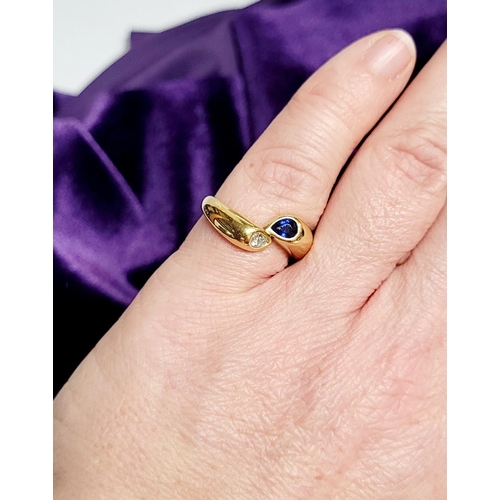 49 - AN 18CT YELLOW GOLD SAPPHIRE & DIAMOND CROSSOVER RING, a beautiful dynamic piece of contemporary jew... 