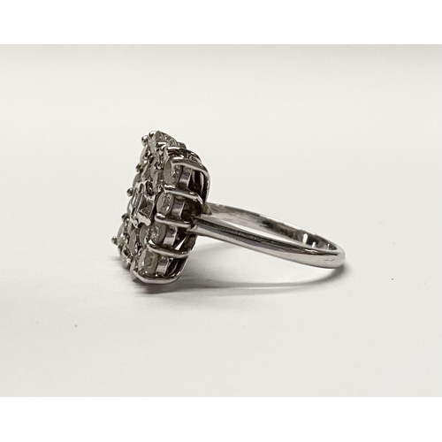 5 - A FANTASTIC 18CT WHITE GOLD ART DECO STYLE DIAMOND CLUSTER RING, with three central baguette cut dia... 