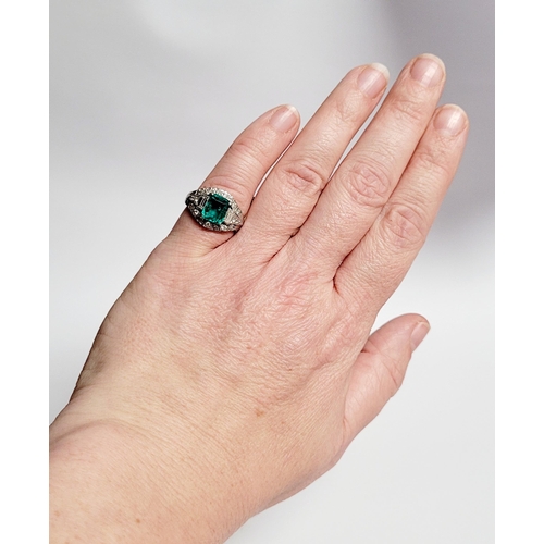 50 - A SPECTACULAR ART DECO MID CENTURY EMERALD & DIAMOND CLUSTERING RING; this fantastic piece of vintag... 