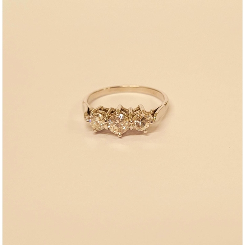 57 - A VINTAGE YELLOW GOLD THREE STONE DIAMOND RING, a pretty setting, perfect for any occasion. Ring siz... 