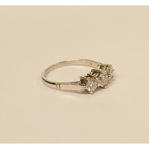 57 - A VINTAGE YELLOW GOLD THREE STONE DIAMOND RING, a pretty setting, perfect for any occasion. Ring siz... 