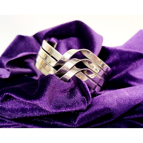 58 - A VERY FINE & WONDERFULLY CRAFTED MID-CENTURY STERLING SILVER WAVE BRACELET BANGLE, comprising of fo... 