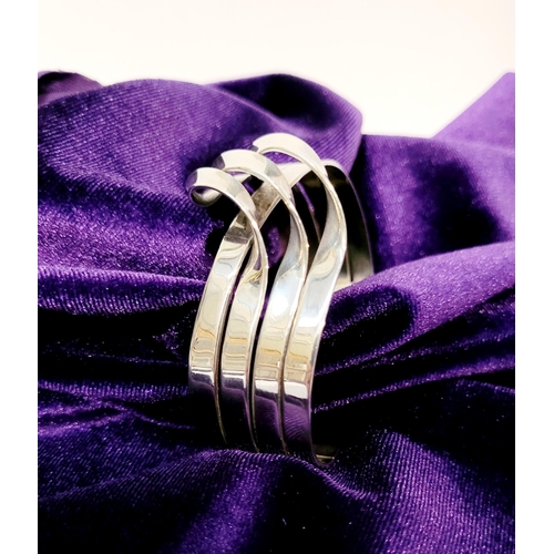 58 - A VERY FINE & WONDERFULLY CRAFTED MID-CENTURY STERLING SILVER WAVE BRACELET BANGLE, comprising of fo... 