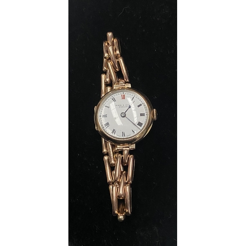 60 - A VINTAGE WEIR & SONS DUBLIN 9CT GOLD CHAIN LINK WRISTWATCH, Swiss Made, with roman numerals to dial... 