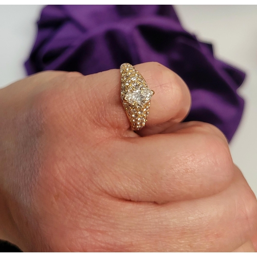 62 - A STUNNING GENUINE CARTIER PAVÉ SET DIAMOND DRESS RING, with a stunning central marquise cut diamond... 