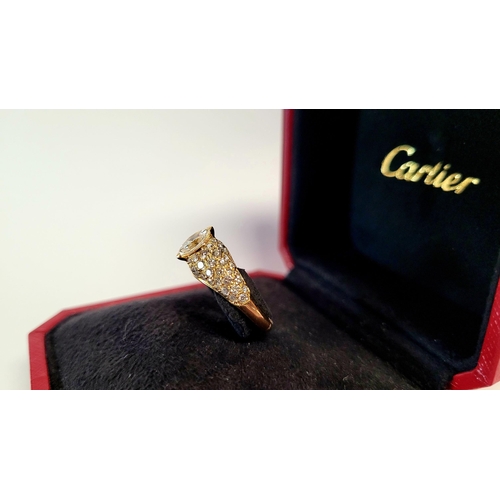 62 - A STUNNING GENUINE CARTIER PAVÉ SET DIAMOND DRESS RING, with a stunning central marquise cut diamond... 