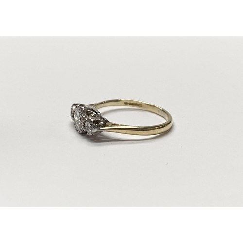 63 - A WONDERFUL 18CT YELLOW GOLD THREE STONE GRADUATED DIAMOND RING, with central large round brilliant ... 