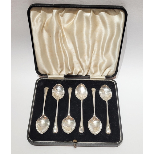 72 - AN EARLY 20TH CENTURY CASED SET OF SIX SILVER SPOONS: each with a simple angled design to the tip. B... 