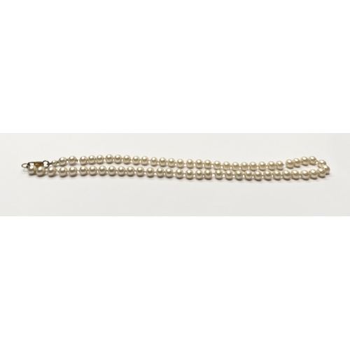 74 - A LOVELY VINTAGE BEADED PEARL NECKLACE, with 9ct yellow gold clasp, dimensions: 46cm long when opene... 