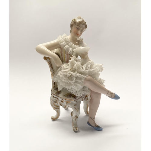 77 - A VINTAGE EUROPEAN LACE PORCELAIN FIGURINE, seated lady reading book, with lace porcelain to dress, ... 