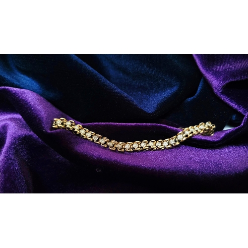 8 - A VERY ATTRACTIVE 14CT YELLOW GOLD VINTAGE DIAMOND LINK BRACELET / TENNIS BRACELET, the unique desig... 