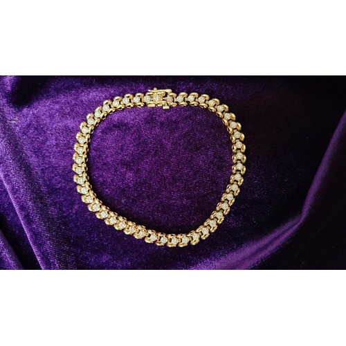 8 - A VERY ATTRACTIVE 14CT YELLOW GOLD VINTAGE DIAMOND LINK BRACELET / TENNIS BRACELET, the unique desig... 