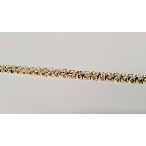 8 - A VERY ATTRACTIVE 14CT YELLOW GOLD VINTAGE DIAMOND LINK BRACELET / TENNIS BRACELET, the unique desig... 