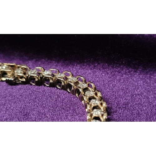 8 - A VERY ATTRACTIVE 14CT YELLOW GOLD VINTAGE DIAMOND LINK BRACELET / TENNIS BRACELET, the unique desig... 