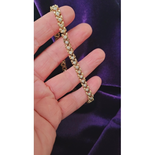 8 - A VERY ATTRACTIVE 14CT YELLOW GOLD VINTAGE DIAMOND LINK BRACELET / TENNIS BRACELET, the unique desig... 