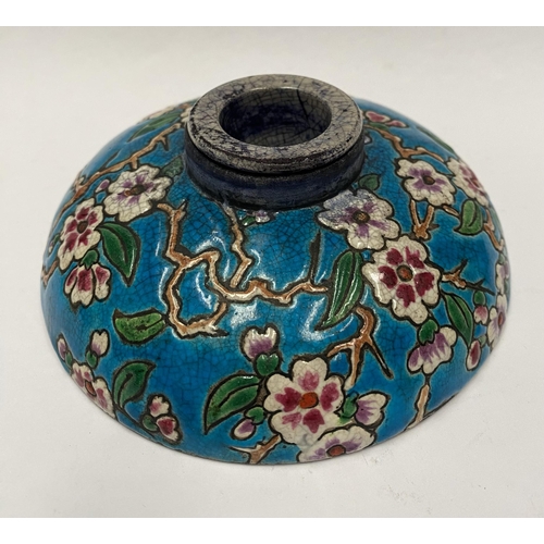 82 - AN EARLY 20TH CENTURY FRENCH POTTERY INKWELL, with cherry blossom design to circular body and cover ... 