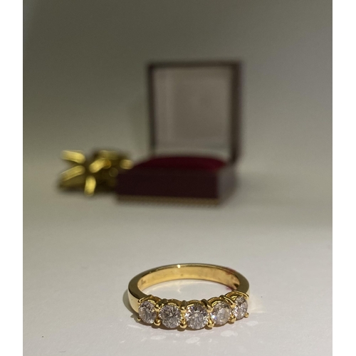 85 - A BEAUTIFUL 18CT YELLOW GOLD FIVE STONE DIAMOND RING, with five round cut diamonds in raised claw se... 