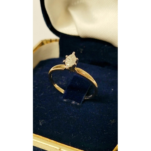 9 - A VERY BEAUTIFUL MARQUISE CUT DIAMOND RING, with a 14ct yellow gold band that tapers towards the cen... 