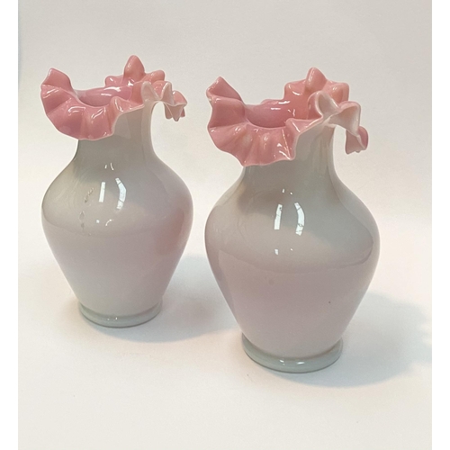 91 - A PAIR OF ANTIQUE GLASS PINK RUFFLE VASES, hand blown glass vases of baluster form with pink ruffled... 