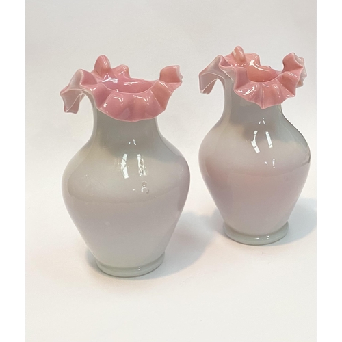 91 - A PAIR OF ANTIQUE GLASS PINK RUFFLE VASES, hand blown glass vases of baluster form with pink ruffled... 