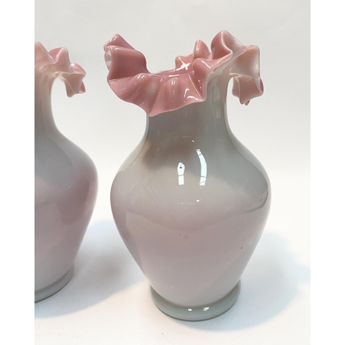 91 - A PAIR OF ANTIQUE GLASS PINK RUFFLE VASES, hand blown glass vases of baluster form with pink ruffled... 