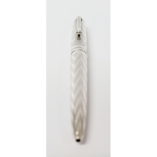 92 - A STERLING SILVER MONTEGRAPPA HERITAGE ITALIAN BALLPOINT PEN, decorated all over with a beautiful gu... 