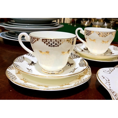 93 - A PARTIAL VINTAGE ROYAL TARA IRISH MADE FINE BONE CHINA TEA SET, includes; 5 x tea cups, 6 x saucers... 