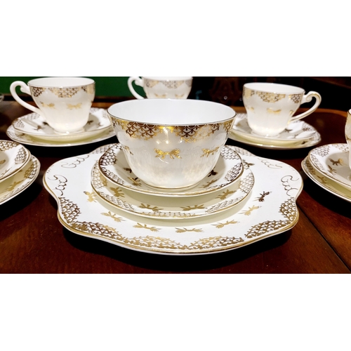 93 - A PARTIAL VINTAGE ROYAL TARA IRISH MADE FINE BONE CHINA TEA SET, includes; 5 x tea cups, 6 x saucers... 