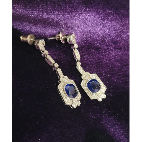 97 - A SPARKLING PAIR OF VINTAGE SAPPHIRE & DIAMOND ART DECO STYLE DROP EARRINGS, each with a central ova... 