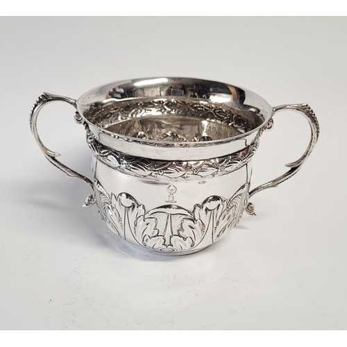 98 - A VERY FINE SOLID SILVER TWO HANDLE BOWL, decorated with beautiful acanthus leaf design to the base ... 