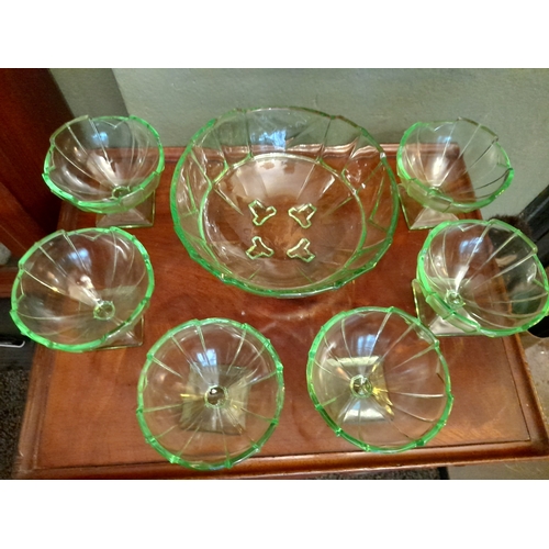 263 - A COLLECTION OF ART DECO GREEN GLASSWARE TO INCLUDE, dessert/punch bowl, along with six small desser... 