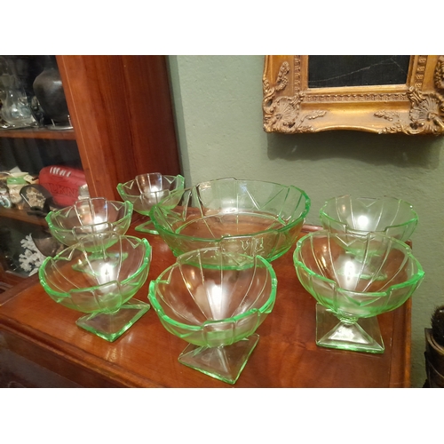 263 - A COLLECTION OF ART DECO GREEN GLASSWARE TO INCLUDE, dessert/punch bowl, along with six small desser... 