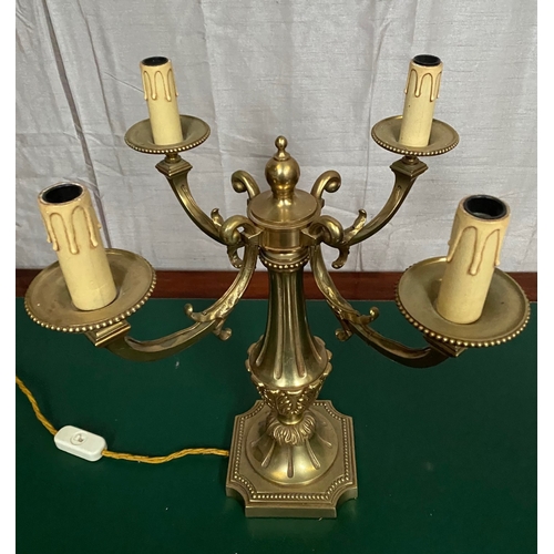 173 - A DECORATIVE FOUR BRANCH BRASS ORMOLU CANDLEABRA LAMP, the four branches with scroll design and bead... 