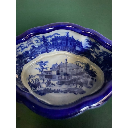 177 - AN EXCELLENT BLUE AND WHITE SHAPED JARDINIERE/FOOTBATH, with blue painted scenes to exterior and int... 