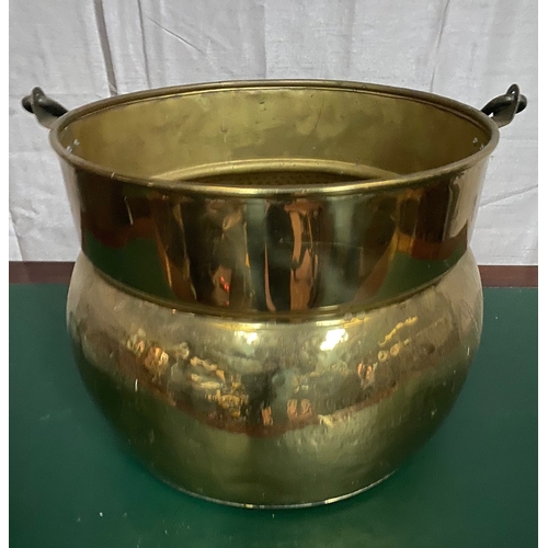 271 - A FINE BRASS LOG/COAL BUCKET, with swing handle, circular base, dimensions: 39cm diameter x 30cm hig... 