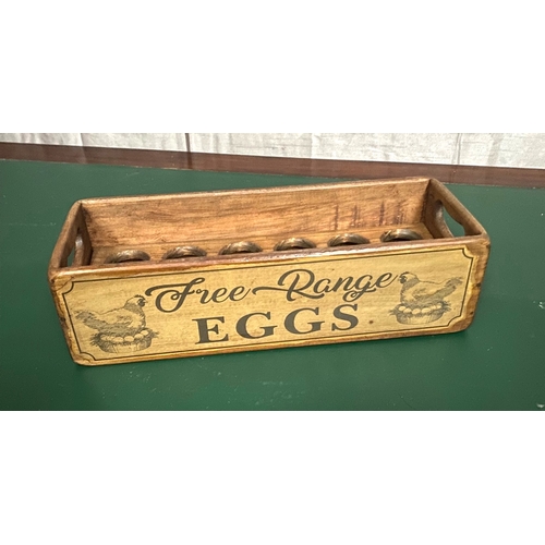 273 - A HARDWOOD FREE RANGE EGG BOX, with inset handles to sides, holds 12 eggs. Dimensions: 37cm x 14cm a... 