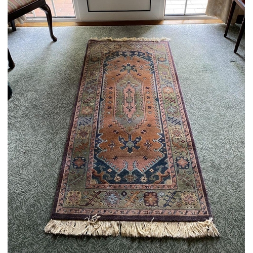 104 - A FINE VINTAGE TURKISH RUG, handwoven with central medallion motif surrounded by multiple borders an... 