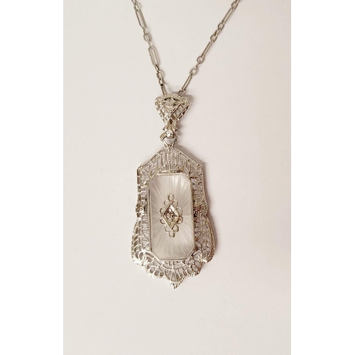 121 - A DELICATE EDWARDIAN STYLE 14CT WHITE GOLD DIAMOND CAMPHOR GLASS PENDANT NECKLACE, the rectangular s... 