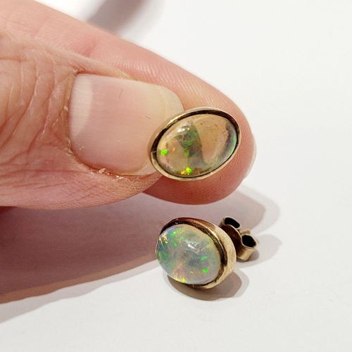 126 - A VINTAGE PAIR OF OVAL SHAPED BEZEL SET OPAL EARRINGS / STUDS, beautiful dynamic movement in the col... 