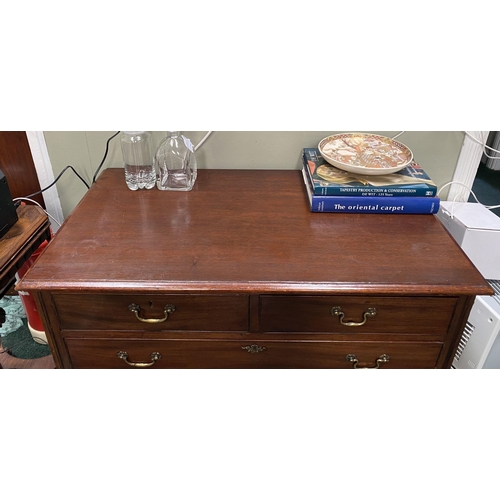 137 - AN ATTRACTIVE NEAT SIZED GEORGIAN MAHOGANY CHEST OF DRAWERS, with molded edge to rectangular top abo... 